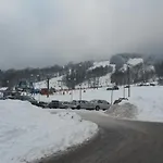 U Sjezdovky Alfa - *